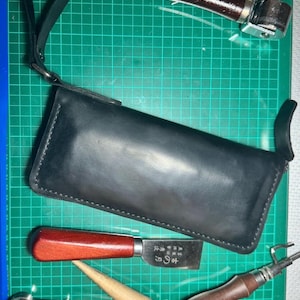 Cartera de cuero hecha a mano