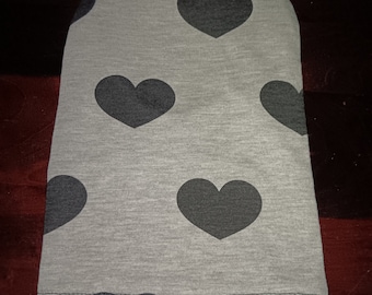 Stoma bag cover Black hearts on grey. 9" length x 2" flange opening. Stretch back, open ended cover. Ileostomy, colostomy urostomy