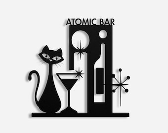 May include: Black metal Atomic Bar sign featuring a stylized cat, martini glass, bottle, and starburst designs. The sign includes the text "ATOMIC BAR" at the top, evoking a mid-century modern aesthetic. Perfect for a home bar or retro-themed space.