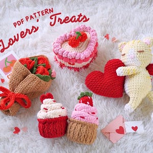 May include: A set of crochet amigurumi patterns for Valentine's Day. The patterns include a heart-shaped cake, a bouquet of strawberries, a cupcake, and a cat holding a heart. The patterns are titled "Lovers' Treats" and are available as a PDF download.