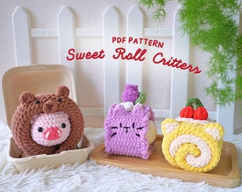 May include: PDF pattern for crocheting "Sweet Roll Critters" - a purple cat, a yellow roll with red cherries, and a brown pig in a brown roll.