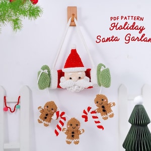May include: A handmade crochet Holiday Santa Garland with a red hat, white beard, and green mittens. The garland includes gingerbread men and candy canes. The text "PDF PATTERN Holiday Santa Garland" is visible.
