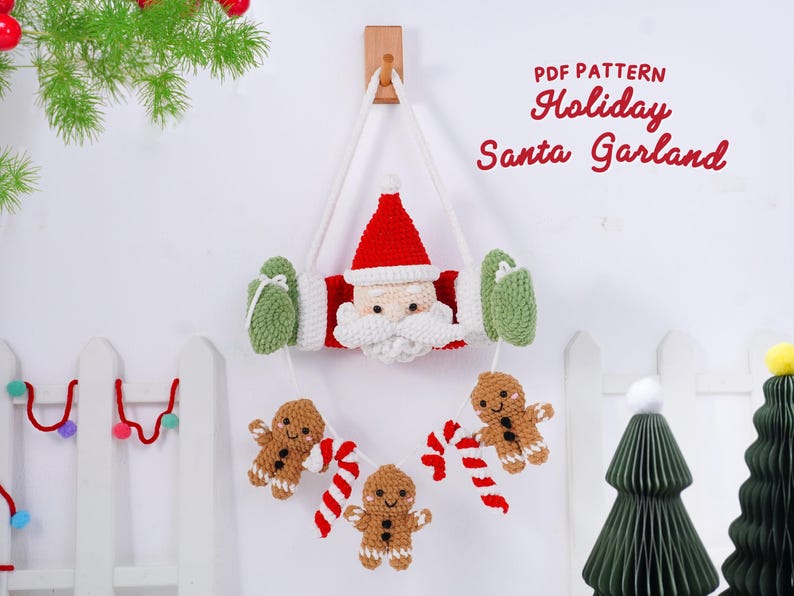 May include: A handmade crochet Holiday Santa Garland with a red hat, white beard, and green mittens. The garland includes gingerbread men and candy canes. The text "PDF PATTERN Holiday Santa Garland" is visible.