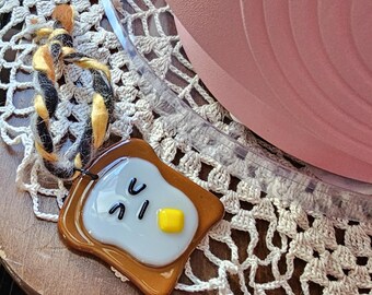 Buttered toast fused glass ornament