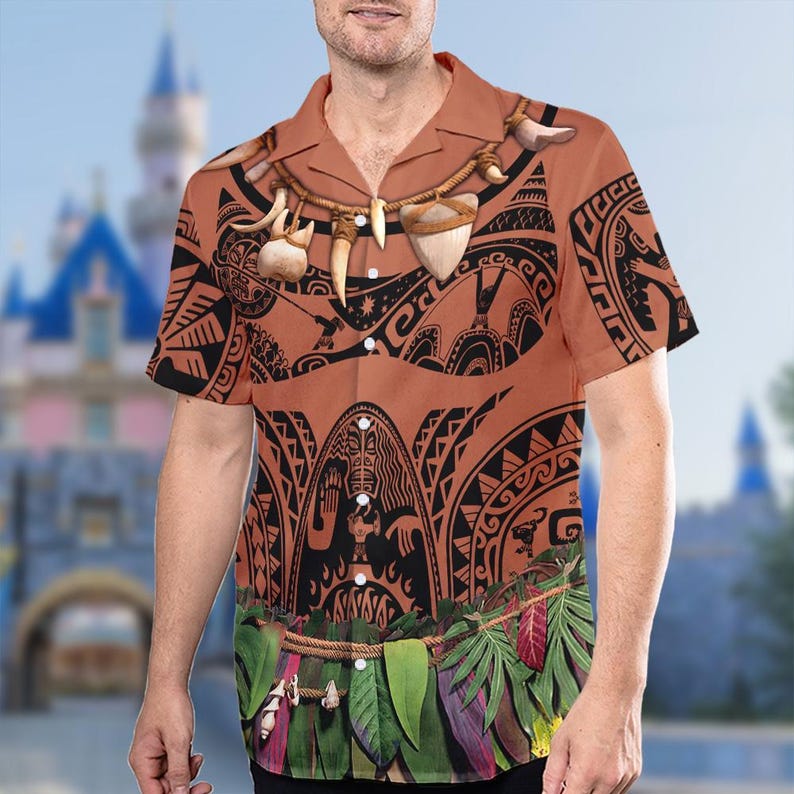 May include: A brown short-sleeved button-up shirt with a Polynesian tribal print. The shirt features a necklace with shark teeth and a belt with green leaves.