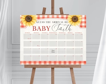 May include: A baby shower calendar sign on a wooden easel. The sign features a red and white checkered border, sunflowers, and the text "GUESS THE ARRIVAL OF BABY Smith." It includes a calendar grid for guests to guess the due date.