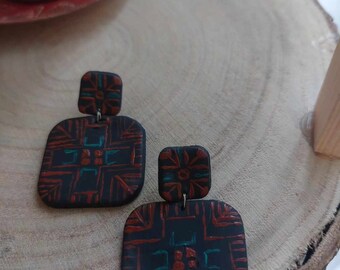 Hand-made Palestinian clay Tatreez- embroidery earrings.