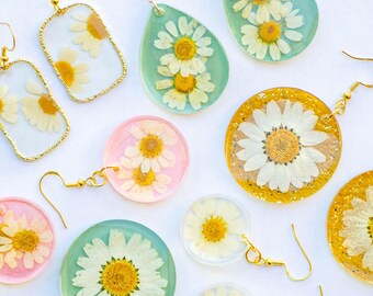 Echte margrietharsoorbellen: glinsterende bloemen hangoorbellen