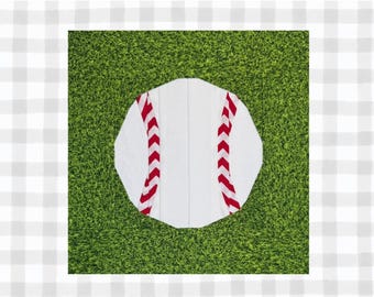 May include: A white baseball with red and white stripes on a green grass background.