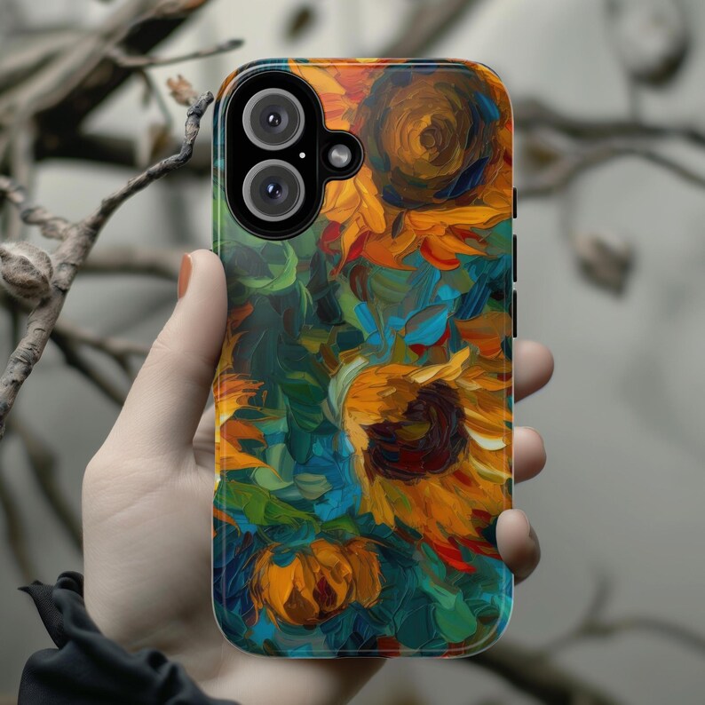 May include: A phone case with a colorful abstract painting of sunflowers. The case has a cutout for the camera lens.