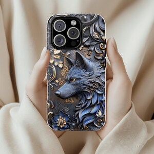 May include: A black and blue phone case with a wolf and floral design. The case has a gold trim and a raised camera bump.