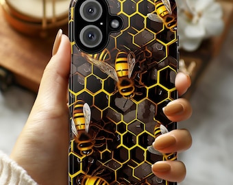 May include: A black phone case with a honeycomb pattern and bees. The bees are yellow and black and are flying around the honeycomb.