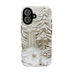 May include: A white phone case featuring a 3D design of a snowy woodland scene. The design includes white trees, a white rabbit, and a white squirrel.