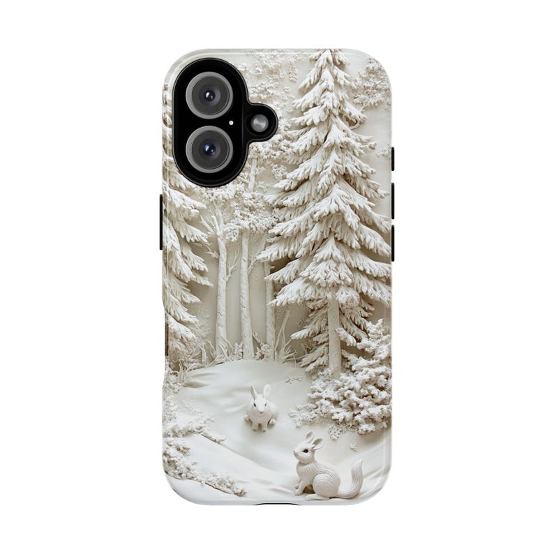 May include: A white phone case featuring a 3D design of a snowy woodland scene. The design includes white trees, a white rabbit, and a white squirrel.