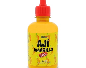 May include: A yellow bottle of Cali Pepper Aji Amarillo Hot Sauce with a red cap. The label features the text "AJI AMARILLO Hot Sauce" and illustrations of yellow chili peppers. The bottle contains 8.4 fl oz (250ml) of hot sauce.