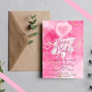 May include: Pink and gold birthday invitation with the text "Shades of Pink" and "Ariel's 23rd Birthday" with a date of March 21st at 5:00 PM. The invitation also includes an RSVP number.