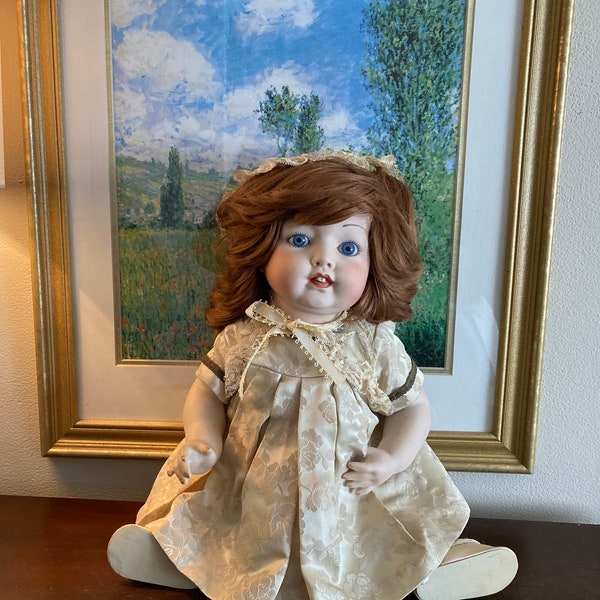 Vintage porcelain Doll - Auburn Hair and Blue Eyes