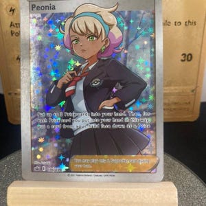 Carte Pokémon Peonia Trainer's 196/198 Holographique - Proxy - Haute Qualité - Carte à collectionner version ANG