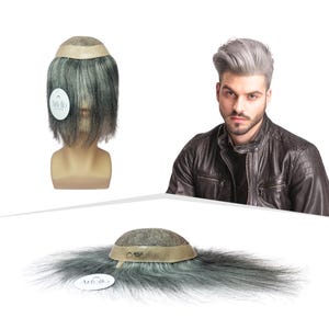 May include: A wig with gray hair is displayed on a mannequin head. The wig has a light brown base and a tag that says "Ardelo". A man with gray hair and a leather jacket is also in the image. A second wig is shown on a white surface.