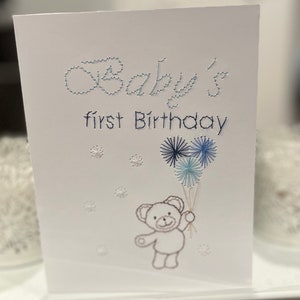 Tarjeta de primer cumpleaños de bebé bordada a mano