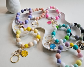 Key chain bracelet silicone beads in desired colors with smiley pendant