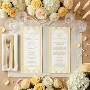 Pode incluir: Uma mesa de recepção de casamento com arranjos florais, velas e talheres. São exibidos dois programas de casamento com os nomes "Samantha e Lucas". Também estão presentes talheres e vidraria dourados.