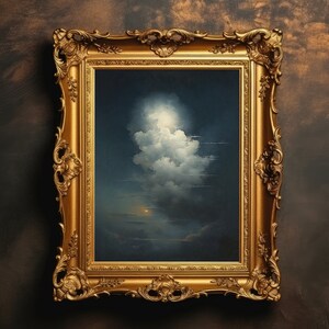 May include: A gold-framed painting depicting a dramatic, stormy sky with a large, white cloud illuminated by a bright light. The painting is set against a dark brown background.