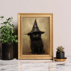 May include: A framed painting depicting a black cat wearing a witch's hat. The cat has yellow eyes and is sitting in a pose reminiscent of a human.