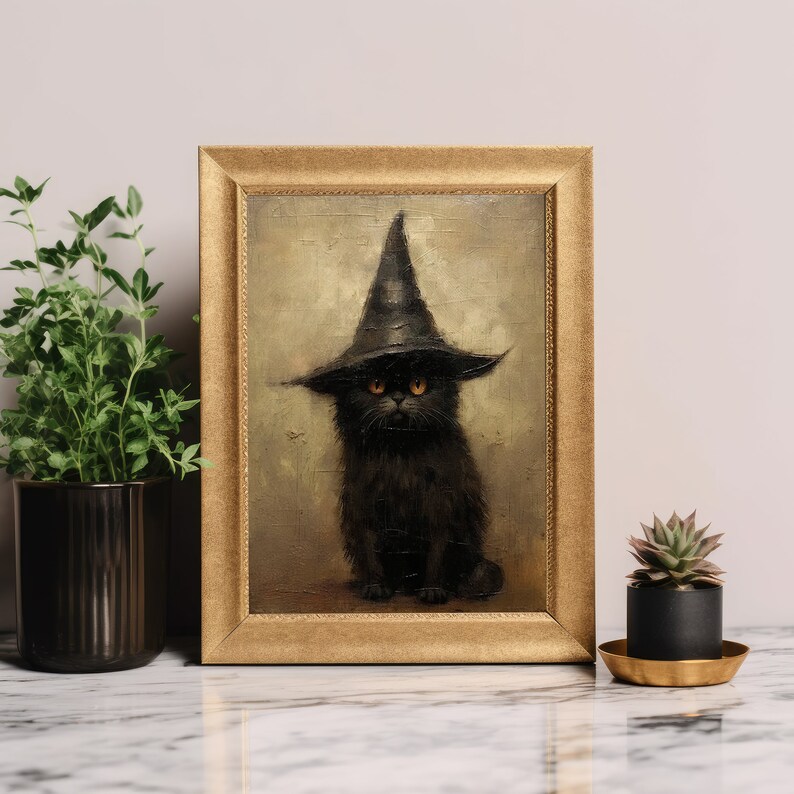 May include: A framed painting depicting a black cat wearing a witch's hat. The cat has yellow eyes and is sitting in a pose reminiscent of a human.