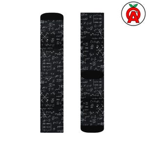May include: Black socks patterned with white mathematical formulas. The socks display equations, symbols, and diagrams, offering a unique and educational design. The socks have a black cuff and toe.