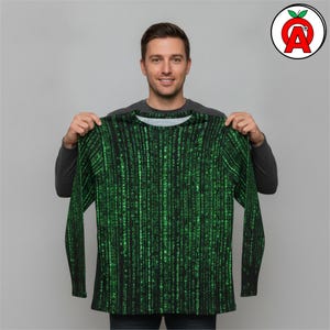 A male software engineer in his 30s showing off Digital Code Long Sleeve T-Shirt, Programmer Graphic Tee, Computer Science Crew Neck Tee, Math Pattern Unisex Shirt