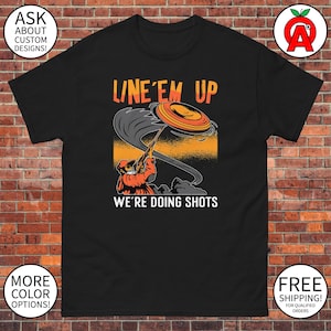 Line&#39;em Up We&#39;re Doing Shots - Unisex T-Shirt, Funny Graphic Tee, Trap Shooting Shirt, Skeet Shooting Tee, Clay Pigeon Tee, Shotgun Sports