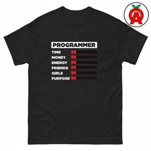 May include: A black short-sleeved t-shirt featuring the white text PROGRAMMER above a list of categories: TIME, MONEY, ENERGY, FRIENDS, GIRLS, and PURPOSE. Each category has a corresponding progress bar with two small red squares at the start.