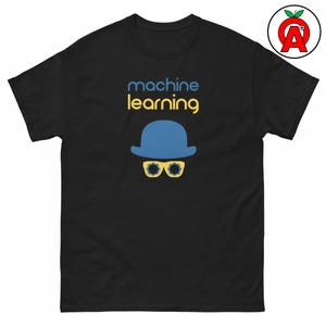 May include: A black short-sleeve t-shirt featuring the text machine learning in blue and yellow letters. Below the text is a blue bowler hat graphic positioned above a pair of yellow glasses with dark circular lenses and gear-like frames.