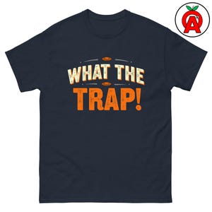 What The Trap Adult Unisex Shirt, Funny Clay Shooting Tee, Trap Skeet Sporting Clays TShirt, Gift for Shooter, Marksman, Gunner, Hunter