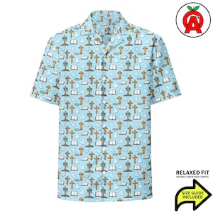 May include: Light blue button-down shirt with a repeating pattern of crosses, open books, clouds, and crowns. The shirt has short sleeves and a relaxed fit. The shirt has a collar and buttons down the front.