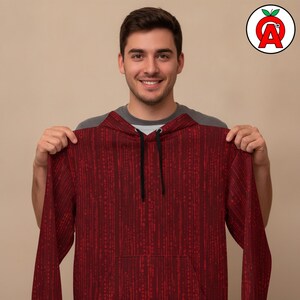 A male computer science student in his early 20s at a hackathon event wearing Matrix Code Hoodie, Binary Pattern Graphic Hoodie, Programming Pullover, Cyberpunk Coder Cozy Sweater, Hacker Unisex Top