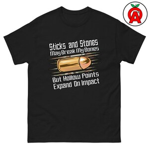 スティックス・アンド・ストーンズ ホローポイント エクスプロード 大人用 ユニセックス クラシックシャツ、プロガン グラフィックTシャツ、2AサポーターTシャツ、タクティカルトップ、愛国心あふれるギフト