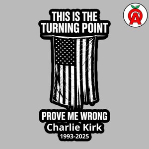 May include: A black and white graphic featuring the text "THIS IS THE TURNING POINT" above a stylized American flag. Below the flag, the text reads "PROVE ME WRONG Charlie Kirk 1993-2025". A logo is in the upper right corner.