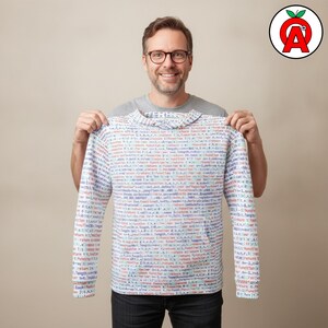 A male programmer in his 40s with a startup aesthetic wearing Computer Programming Code Graphic Hoodie, Coding Pattern Pullover, Developer Cozу Sweater, Software Engineer Unisex Top