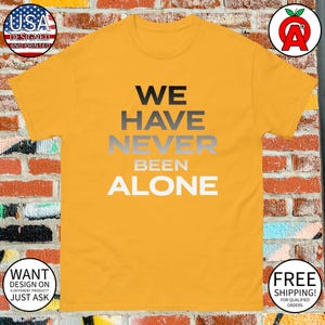 We Have Never Been Alone Alien UFO Astronaut Shirt – Unisex T-Shirt Gifts for Sci-Fi Fans and Space Enthusiasts
