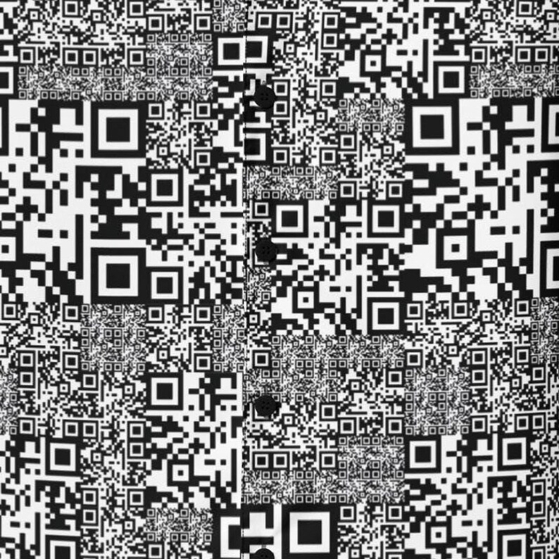 A man in his 20s with tech-industry styling wearing QR Code Hawaiian Shirt, Barcode Button Down, Matrix Aloha Shirt, Data Camp Shirt, Tech Button Up, Scanner Beach Top