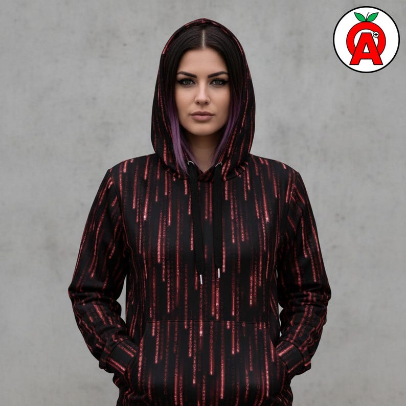 A female cybersecurity analyst in her 20s with edgy tech-forward style showing off Matrix Code AOP Hoodie, Binary Pattern Unisex Top, Digital Rain Graphic Pullover, Cyberpunk Soft Sweater, Computer Programming AOP Hoodie