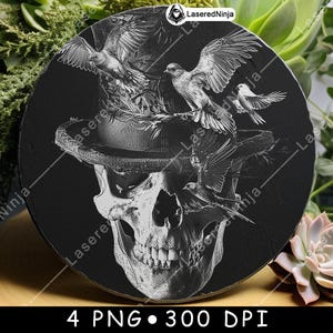 May include: A black, circular decorative item with a detailed engraving of a skull wearing a hat, with several birds perched on the hat and flying around it. The image is in monochrome.