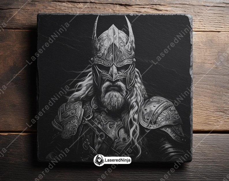 May include: Black and white illustration of a warrior wearing a horned helmet and armour. The warrior has a long beard and a serious expression.