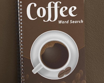 Könnte beinhalten: Ein braunes spiralgebundenes Notizbuch mit den Worten "Coffee Word Search" auf dem Cover. Das Cover zeigt eine weiße Kaffeetasse mit braunem Kaffee darin und braunen Kaffeebohnen.