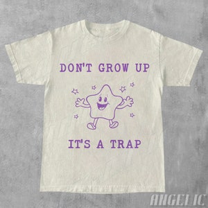 Don't Grow Up It's A Trap Vintage Graphic T-Shirt, Retro 90s Funny Sayings Tee, Minimalistic Cute Shirt, Silly Gifts