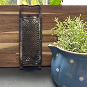 Old antique grater, potato grater, sieve, decorative vintage shabby chic