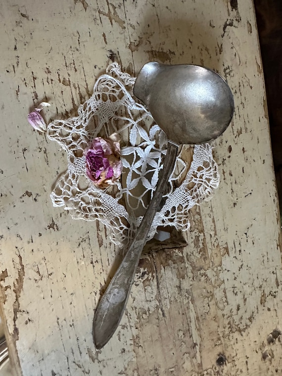 Old antique ladle sauce ladle cutlery vintage decorative shabby