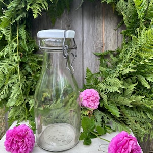 Old antique milk bottle with porcelain stopper glass bottle decoration vintage
